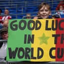 A fan with a message on a sign for lliman Ndiaye of Sheffield United before he represents Senegal in Qatar: Darren Staples / Sportimage