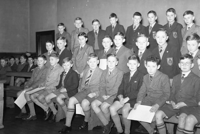 The West Hartlepool Grammar School choir gets in some practice in this scene. Do you remember being part of a school choir?