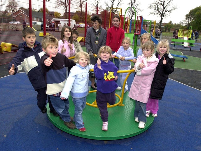 Tickhill Town Council Mayor Catherine Chambers joined in the fun after officially opening the new children's play area in 2003
