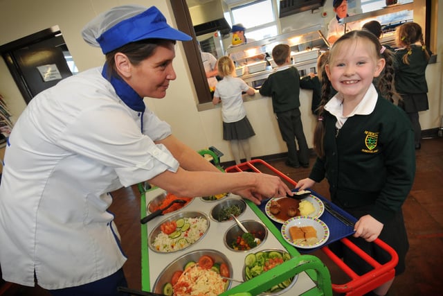 Fancy a rice salad with coleslaw? How about meatballs and mash with cake to follow? Just some of the choices in this 2014 scene at Hillview Infants School.