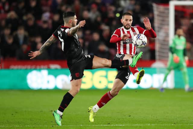 Conor Hourihane of Sheffield United (right) and Alex Mowatt of West Bromwich Albion battle for the ball during the Sky Bet Championship match at Bramall Lane, Sheffield last week: Isaac Parkin / Sportimage