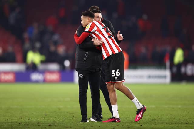 Paul Heckingbottom, manager of Sheffield United, interacts with Daniel Jebbison: Naomi Baker/Getty Images