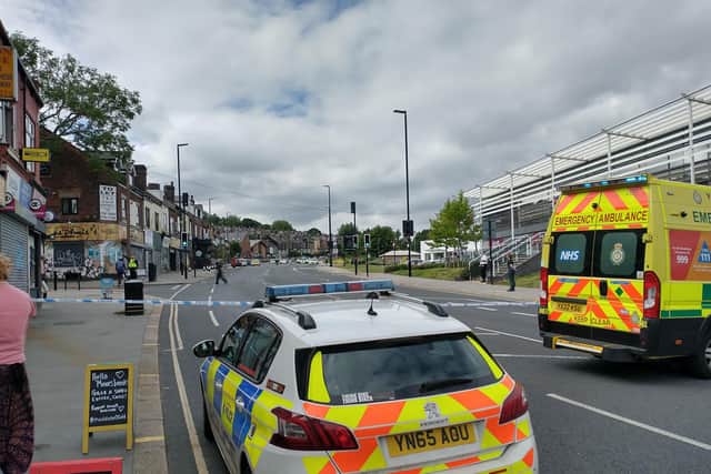 Emergency services on Chesterfield Road in Heeley, Sheffield, where they were called over concerns for a man's safety. The man was brought down safely from the roof after around 12 hours and was arrested on suspicion of harassment, threats to kill, affray and criminal damage