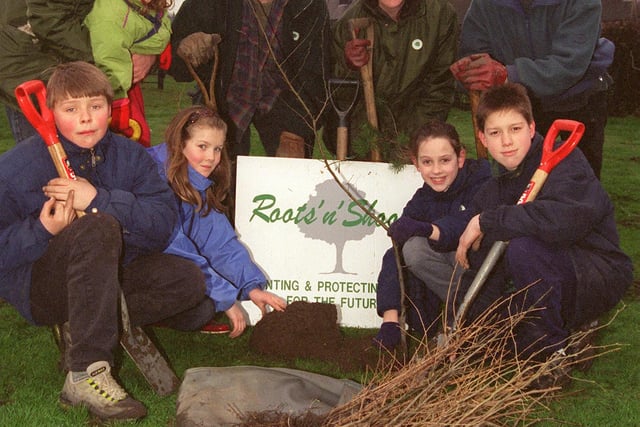 Some of the people who helped to plant soem 1.000 young tress on  Grenoside Recreation ground in 1998. from left back row, Grahame Armitage with daughter Megan,Tim Shortland, Gabby Reade and Dave Buckle. Front row.. Michael Cook, Katie Bulloss, Martin Bott and Gavin Marshall