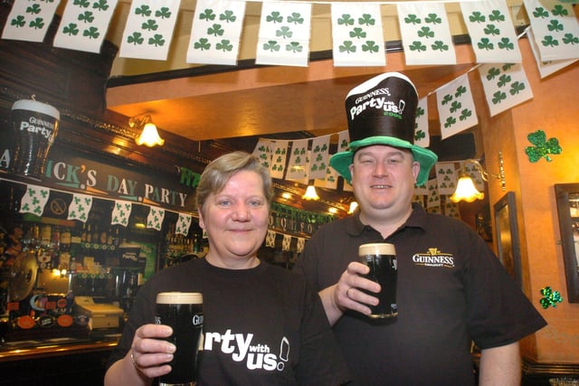 The George Inn, Market Street, Woodhouse, Sheffield, where landlord Wayne Hodgkins is seen with Anne-Marie Ball, the assistant manager, in the bar decorated for the St Patrick's Day party
