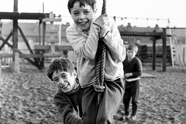 Enjoying the rope swing in the Ripon Street adventure playground in 1970