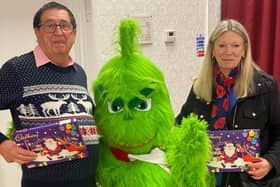 Councillors Alan Hooper and Councillor Vickie Priestley with the Grinch.
