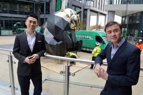 Giant rooftop panda sculpture being installed at New Era Square Sheffield. Rongmin Qin executive director and Jerry Cheung MD New Era development UK.
