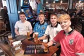 England fans at The Clubhouse pub in Sheffield. Pictured left to right are Ross Findleay, Sid Toovey, Leon Clark and Ethan Slater