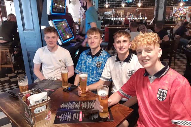 England fans at The Clubhouse pub in Sheffield. Pictured left to right are Ross Findleay, Sid Toovey, Leon Clark and Ethan Slater