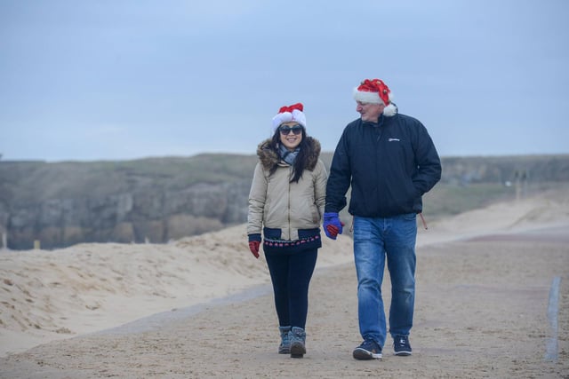 Friends and families enjoy Christmas morning at Sandhaven Beach in South Shields. Pictures by North News.