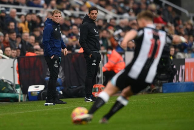 Newcastle manager Eddie Howe (l) and coach Jason Tindall watch from the sidelines during the Premier League match between Newcastle United  and  Manchester City at St. James Park on December 19, 2021 in Newcastle upon Tyne, England. (Photo by Stu Forster/Getty Images)