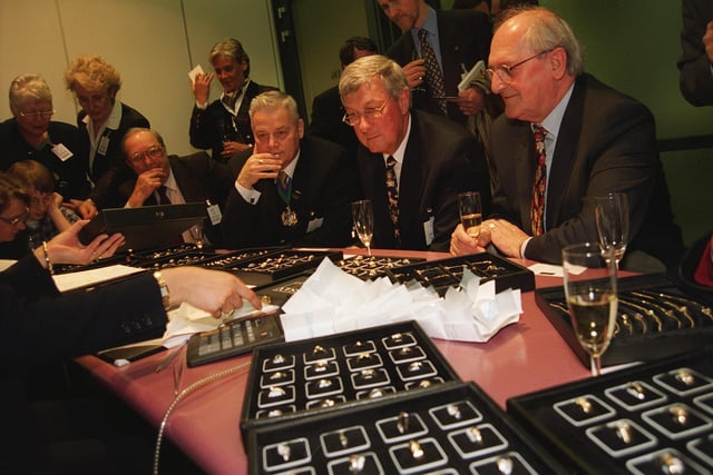 Lord Mayor Tony Arbour and other guests from Sheffield inspect over £600,000 of diamonds at a diamond warehouse in Amsterdam after the first flight from Sheffield City Airport landed in Amsterdam