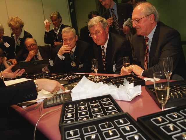 Lord Mayor Tony Arbour and other guests from Sheffield inspect over £600,000 of diamonds at a diamond warehouse in Amsterdam after the first flight from Sheffield City Airport landed in Amsterdam