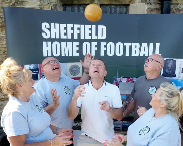 Members of the Sheffield Home of Football Charity (centre) John Clarke, John Stocks, Andy Kershaw and Barbara Walker, with local counclilor Denise Fox (left) and Ted Talbot from Green Estate