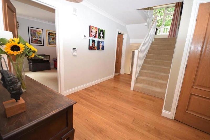 A welcoming reception hall leads to all the ground-floor rooms in the house. There is underfloor heating throughout.