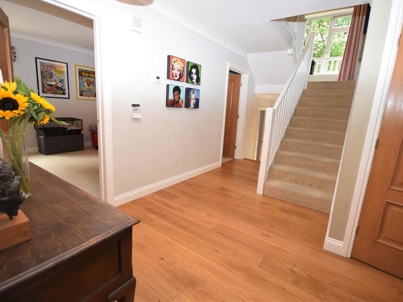 A welcoming reception hall leads to all the ground-floor rooms in the house. There is underfloor heating throughout.