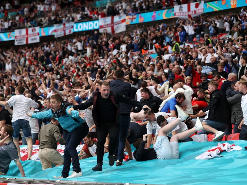 England fans celebrate after their side's first goal was scored by Raheem Sterling at Wembley Stadium (Carl Recine/Pool/Getty Images)