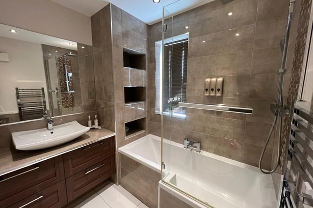 The family bathroom is described as stylish and features a four-piece suite.