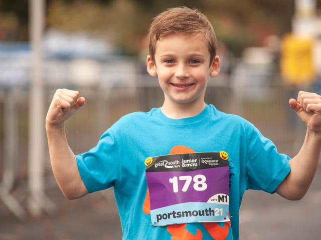 One of the young competitors flexes before taking part in Saturday's Great South Run Junior and Mini events. Photo: Gary Tiller