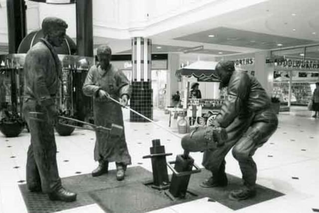The Crucible teemers sculpture at Meadowhall, pictured here in September 1991, was initially on display inside the shopping centre before being moved outside in 2012. It was created by Robin Bell