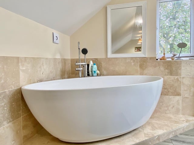 The bath in the ensuite for the master bedroom.