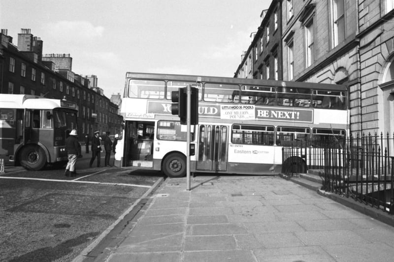 An Eastern Scottish bus rolled backwards, crashing through the railings of a York Place flat in Edinburgh, May 1988. 