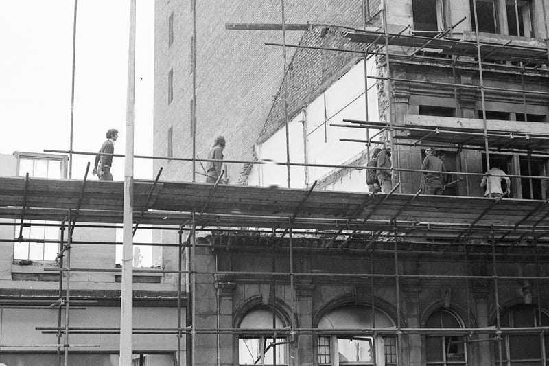 Workmen on the scaffolding as they get ready to prepare the building for demolition in 1974.