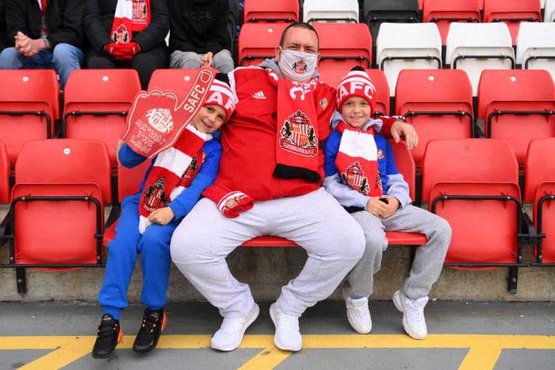 Sunderland fans pose for a photo inside the Stadium of Light.