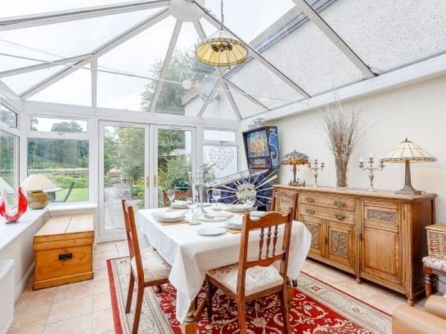 The dining area is in the spacious conservatory.
