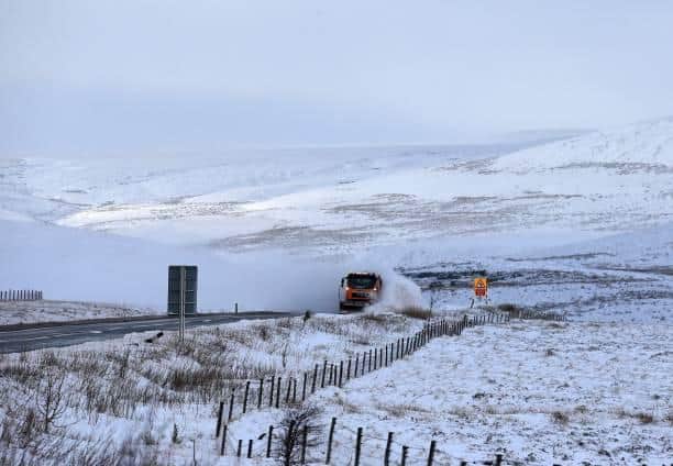 There have been reports of abandoned and crashed vehicles on the A57 Snake Pass between Sheffield and Manchester due to heavy snow. Photo by LINDSEY PARNABY/AFP via Getty Images.