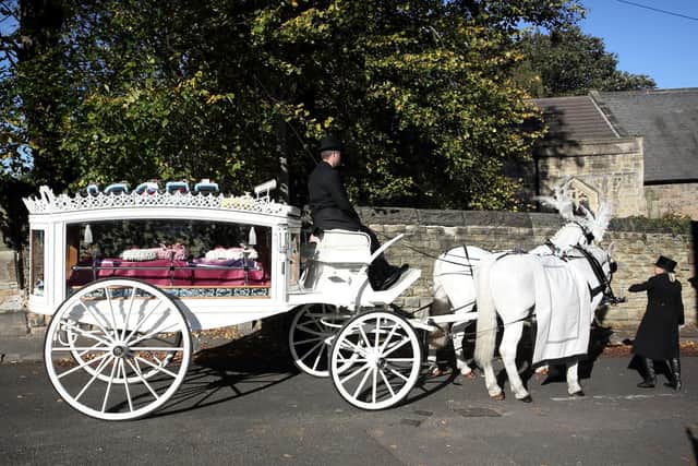 The funeral of Terri Harris at St Giles Church Killamarsh, October 21 2021. See SWNS story SWLEfuneral. Mourners have gathered to pay tribute to a mum killed along with her two children and their friend at a sleepover. Terri Harris, 35, her children John Paul Bennett, 13, and Lacey Bennett, 11, and Lacey's friend Connie Gent, 11, were found by cops on Sunday, September 19