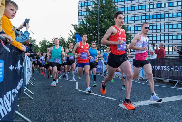 Andrew Heyes, the winner, sets off from the Sheffield Half Marathon start line.