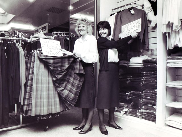 Our picture shows Atkinson's staff, Lisa Chilton (left) and Helen Warren, who are marking up garments in preparation for Blue Pencil Day in January 1989