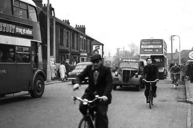 Cars, buses, vans and bikes are all pictured in this Albert Road scene. Can anyone guess at the year of the photo?