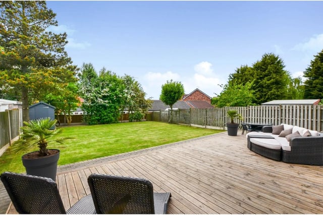 At the back of the house is a good sized garden which is mainly laid to lawn, fully enclosed and having a decked area which is perfect for entertaining or relaxing.