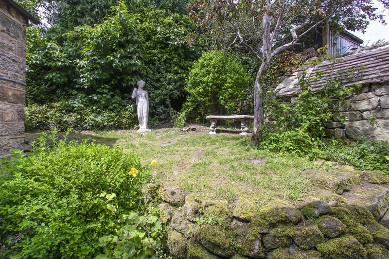 Tranquil mature gardens surround the property.