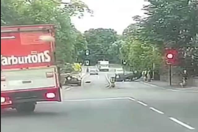 A car has overturned outside Longley Park Sixth Form in Sheffield this morning