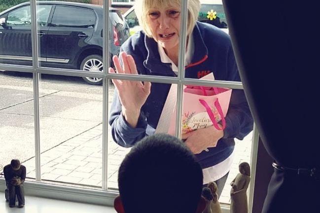 Gemma Walker writes on Facebook: "My NHS hero is my mum. Been nursing her whole adult life - cares beyond the responsibility of a nurse. She is a specialist nurse at King's Mill. This picture was one of the most heartbreaking pictures ever taken. Staying away from her family, especially her grandchildren in order to serve and protect the country. My mum Jane Cook was redeployed into ITU to work with the coronavirus patients as well as look after her service. My mum then caught corona and beat it. As soon as she was well enough, she returned to her specialist role. She continues to give 110 per cent to her job. If I'm half the woman she is, I will have done something right."