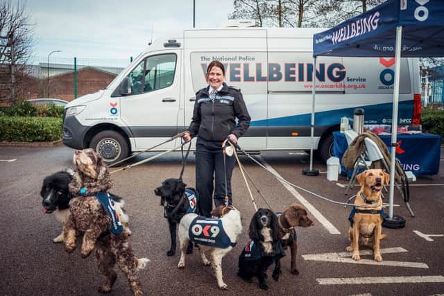 Chief Constable Lauren Poultney with the wellbeing and trauma support dogs available for South Yorkshire police officers and staff members after serious and traumatic incidents