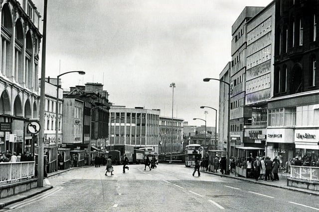 The shops in High Street, Sheffield, including Saxone, Lilley & Skinner, Bellmans, Hector Powe, Dolcis, C&A and Peter Robinson in 1973