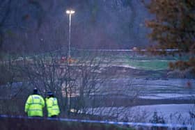 The scene in Babbs Mill Park in Kingshurst, Solihull. Four children are in critical condition in hospital after being pulled from an icy lake in cardiac arrest, while a search operation continues amid fears two more children were involved in the incident. Photo Jacob King/PA Wire