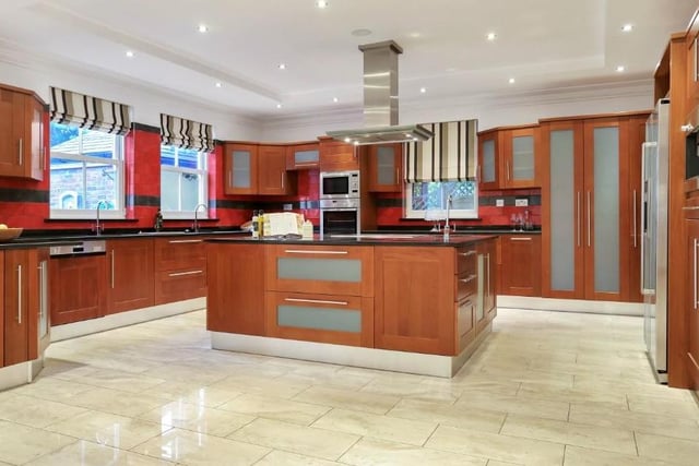 Whether it be for entertaining or enjoying family breakfast, this stylish dining kitchen is at the heart of the home. There is a wealth of base and wall units, plenty of worktop space and a central island that houses a double-width oven and six-point electric induction hob with extractor over.