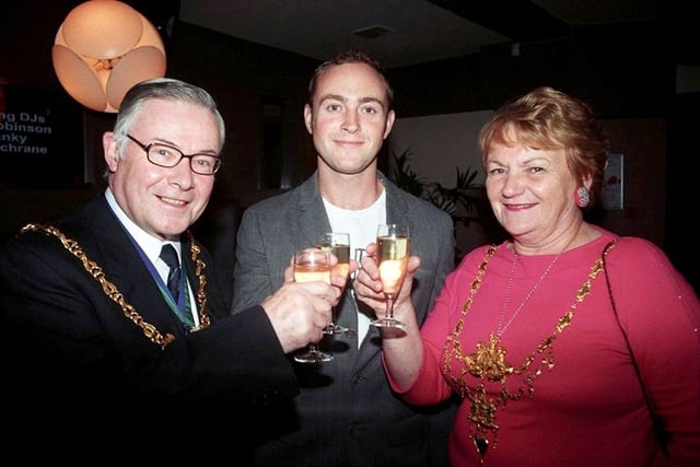 The Lord Mayor and Lady Mayoress, Coun Mike and Josephine Pye, enjoy a drink with Takapuna owner Chris Jordan, at the Lord Mayor's charity evening in April 2005