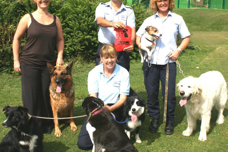 The "Taking the Lead" campaign visited Queen's Park.Picture attached shows Borough Council staff involved in the roadshow: (back, l to r) Sherri Stock, Mark Rawson, Michelle Hill, (front) Mitch Curran with dogs Sophie Tucker, Midge, Little Gem, Millie, Georgia and Oscar.