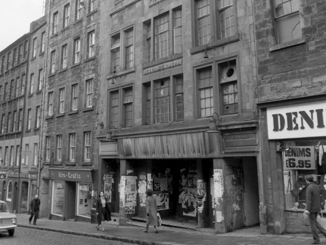 Exterior of the New Palace cinema in Edinburgh's High Street, which closed in 1957 and later became a popular night club. The ground floor level is now a retail unit and sells souvenirs.