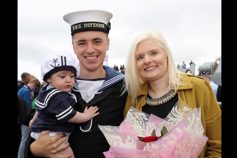 HMS Defender returns home. 
ET(WE) Rowan Chappell reunited with Nephew Rhys Chappell and Girlfriend Keri Allen. The Portsmouth-based warship HMS Defender returned home today 8th July 2016 from a nine month deployment to the middle east carrying out security operations.

The Band of Her Majesty’s Royal Marines Portsmouth performed on the jetty as the crowds eagerly awaited the return of sailors on board.

Hundreds of proud family and friends waved and cheered as the ship came alongside, clearly delighted to welcome their loved ones home. Image: LPhot Kyle Heller