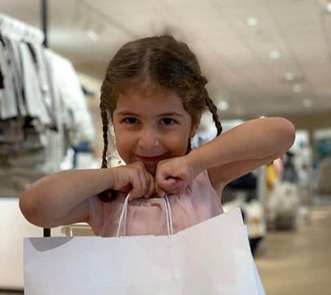 Nza Ahmad, aged four, was pleased with the birthday clothes she bought from the newly reopened H&M store on The Moor