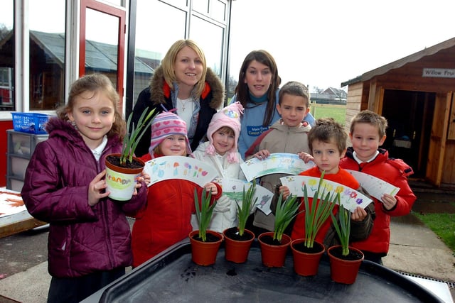 Willow Primary School pupils in 2006, from left, Eleanor Goodwin, aged seven, Laura Morris, Hannah Ormandy, both aged four, Joel Hopwell, Joe Black, both aged six,  and Kieran Johnson, aged five, are pictured with daffodils, the logo of Marie Curie Cancer Care, for which the school has raised funds. Looking on are teacher Lisa Almunshi and Lucy Ing, Marie Curie Cancer Care fund-raiser for South Yorkshire.