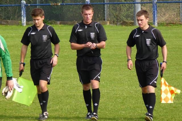 Tom Bramall, centre, has been promoted to the Premier League - pictured in action with brother Josh, right